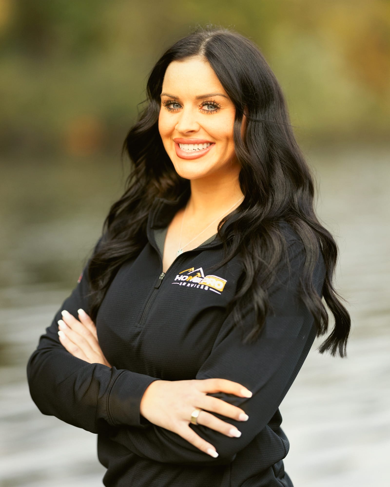 Lindsey, brand ambassador for HomePro Services, by a Michigan lake