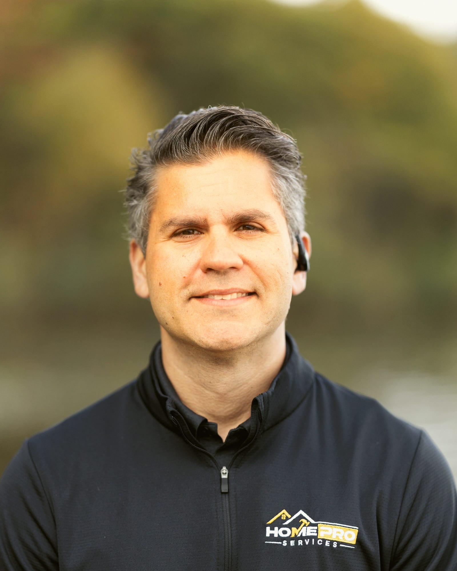 Lourenzo Da Silva, president of HomePro Services, by a Michigan lake